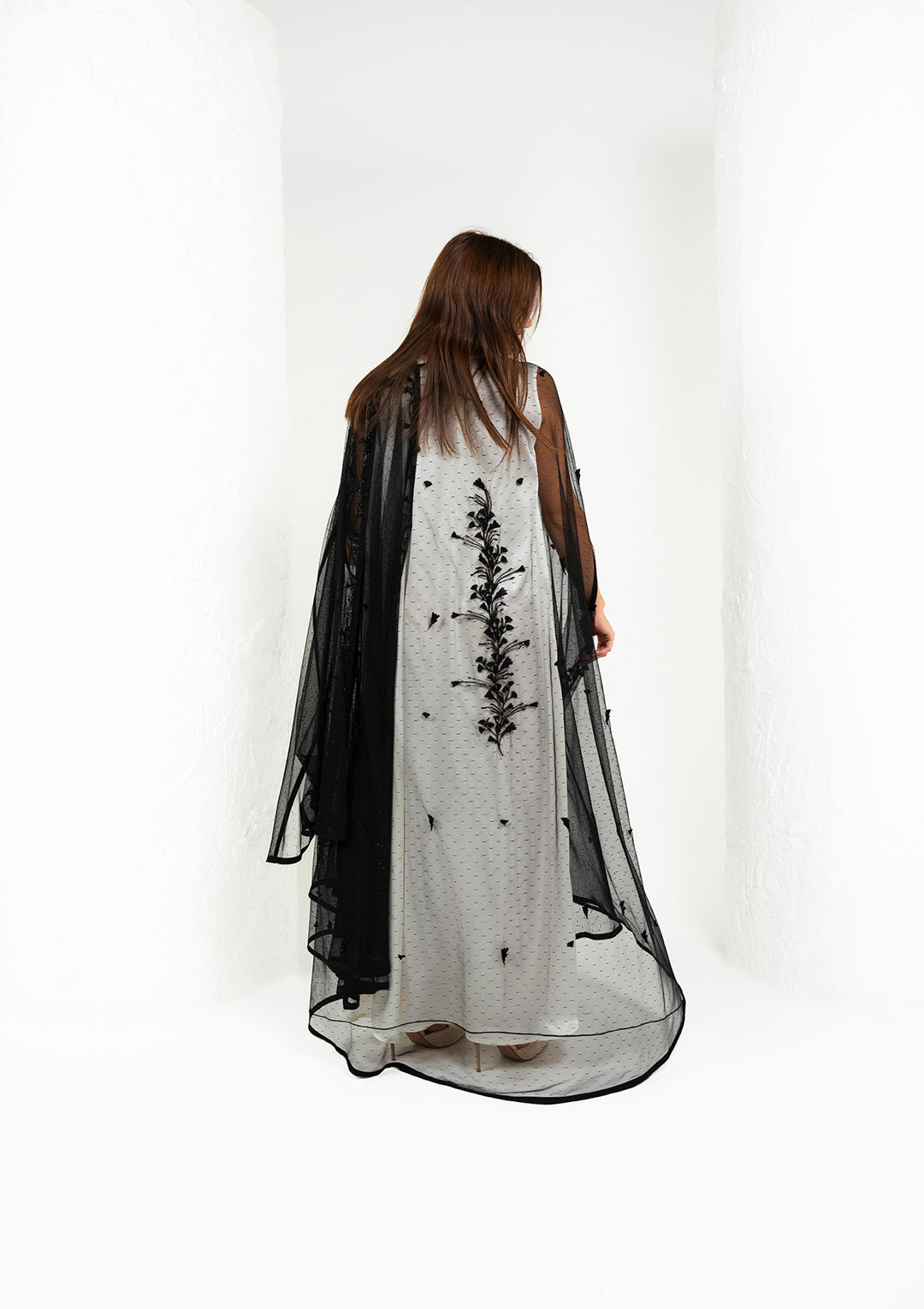 Black wedding abaya back close-up — 3D laser-cut botanical detail Al Anood