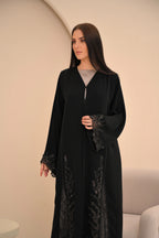 Aari embroidery detail black Nida abaya — Al Anood luxury collection