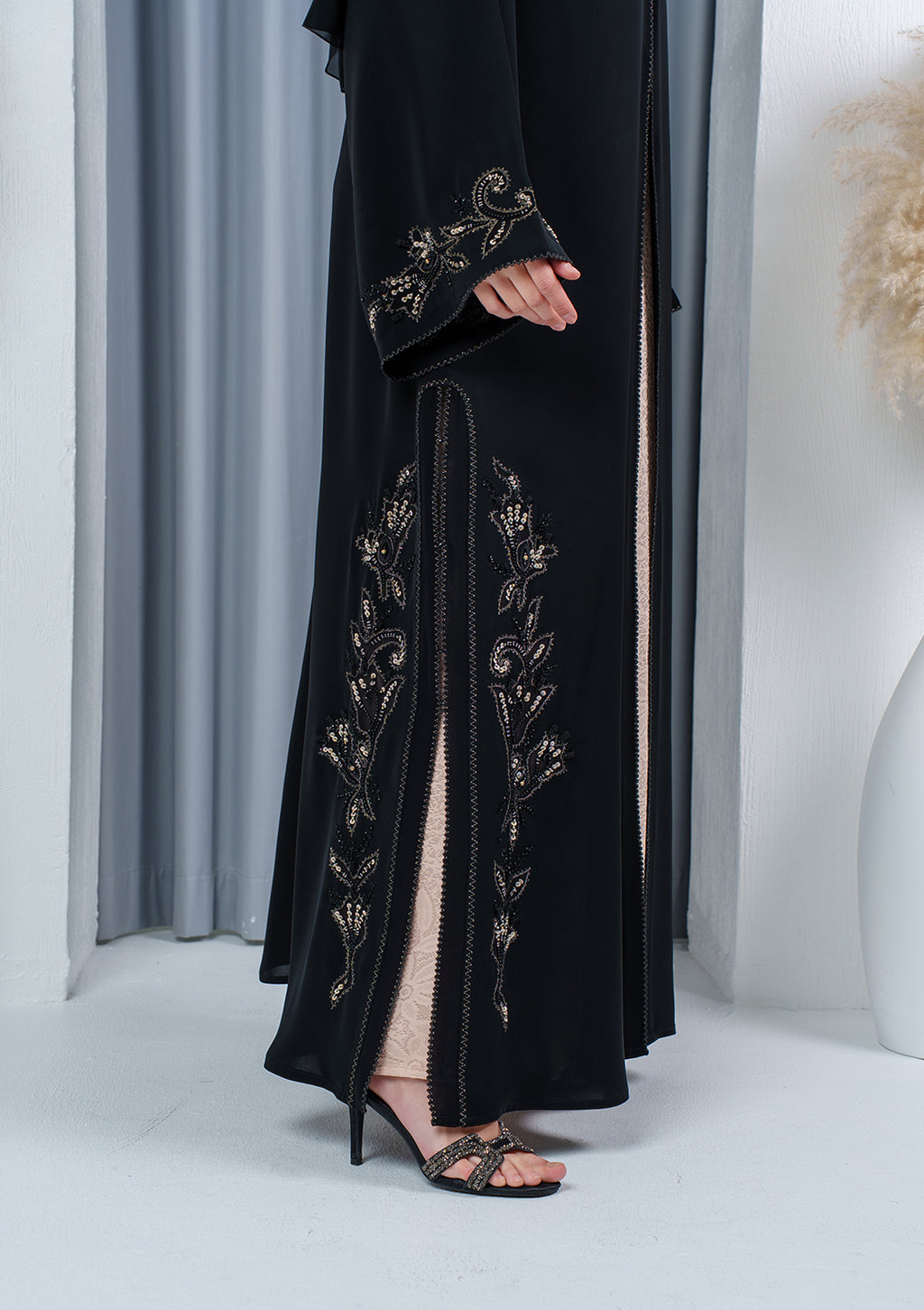 Luxury black embroidered abaya with lace details made from Nida fabric by Al Anood