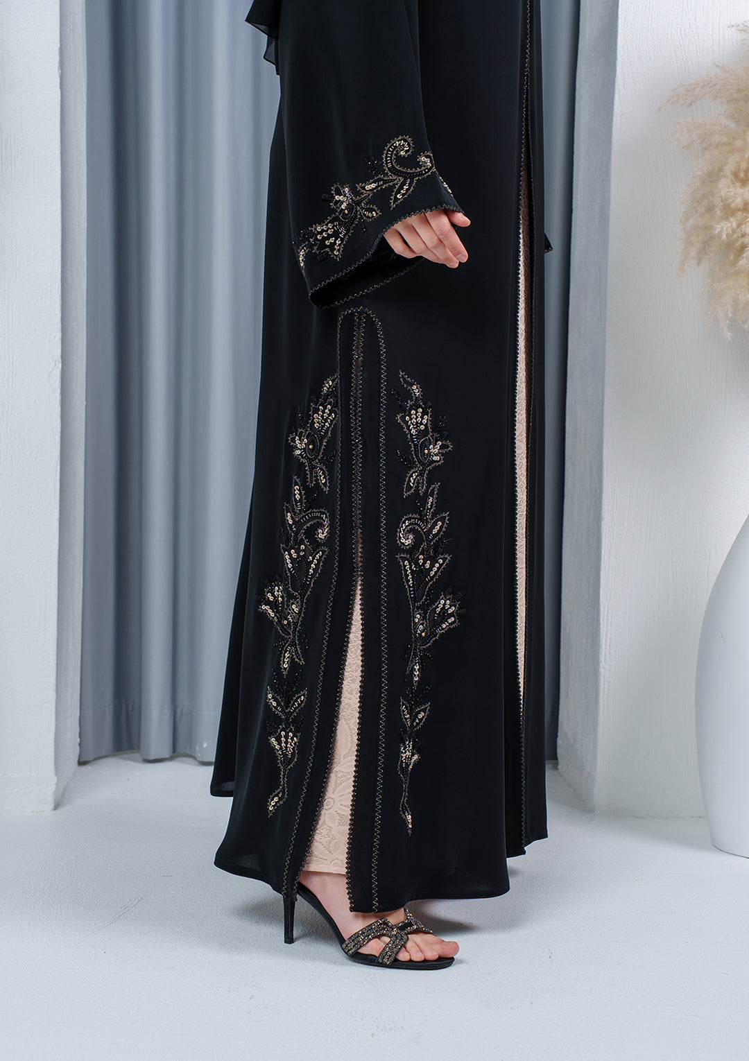 Luxury black embroidered abaya with lace details made from Nida fabric by Al Anood