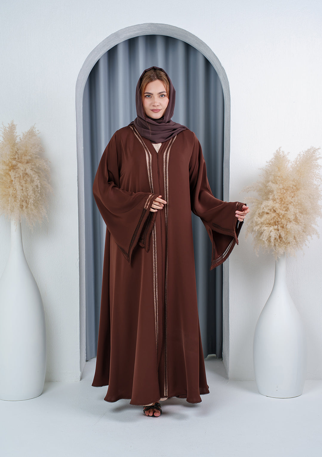 Minimal abaya with picoting stitching detail