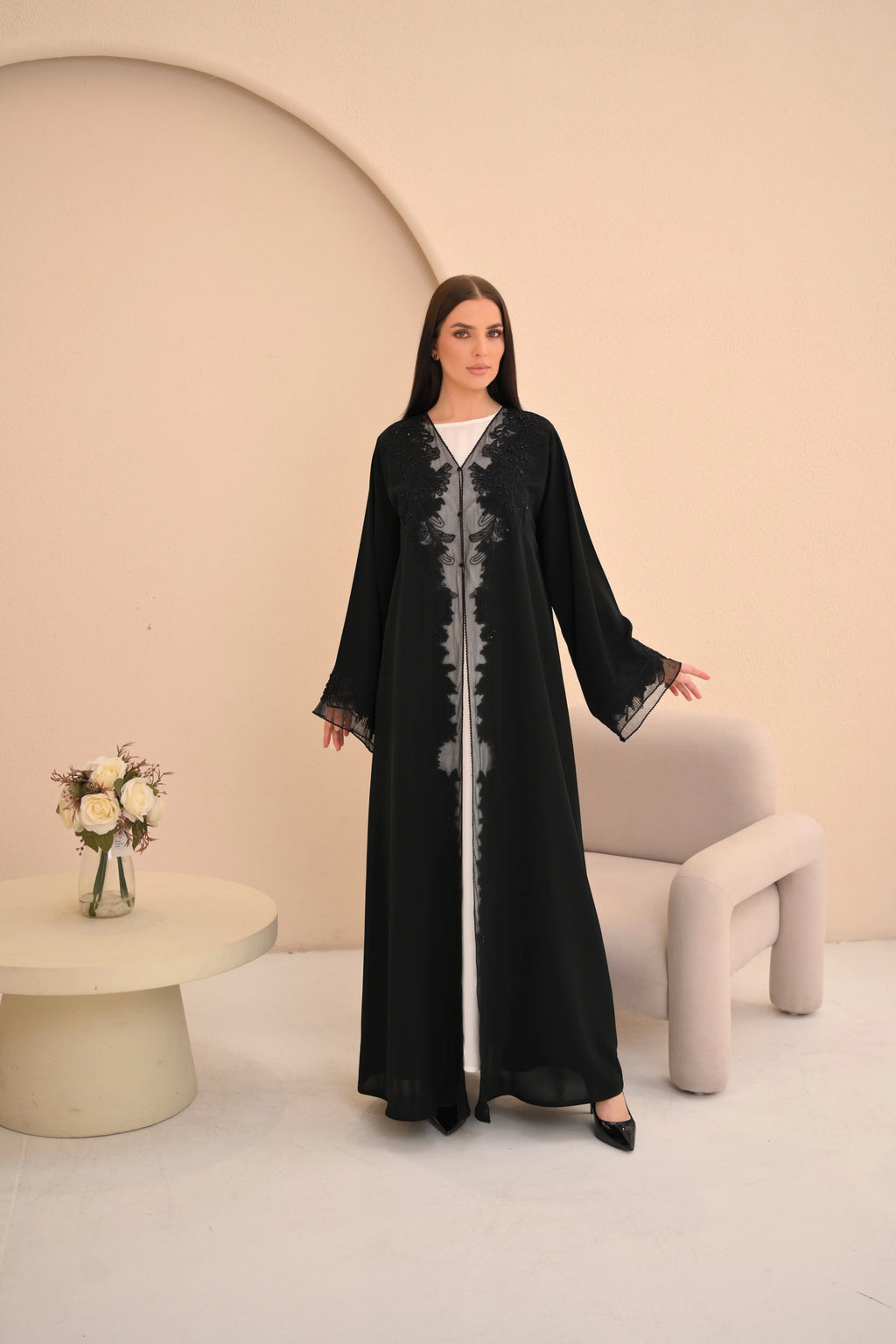 Black Nida abaya with floral embroidery and sheer panel — Al Anood UAE