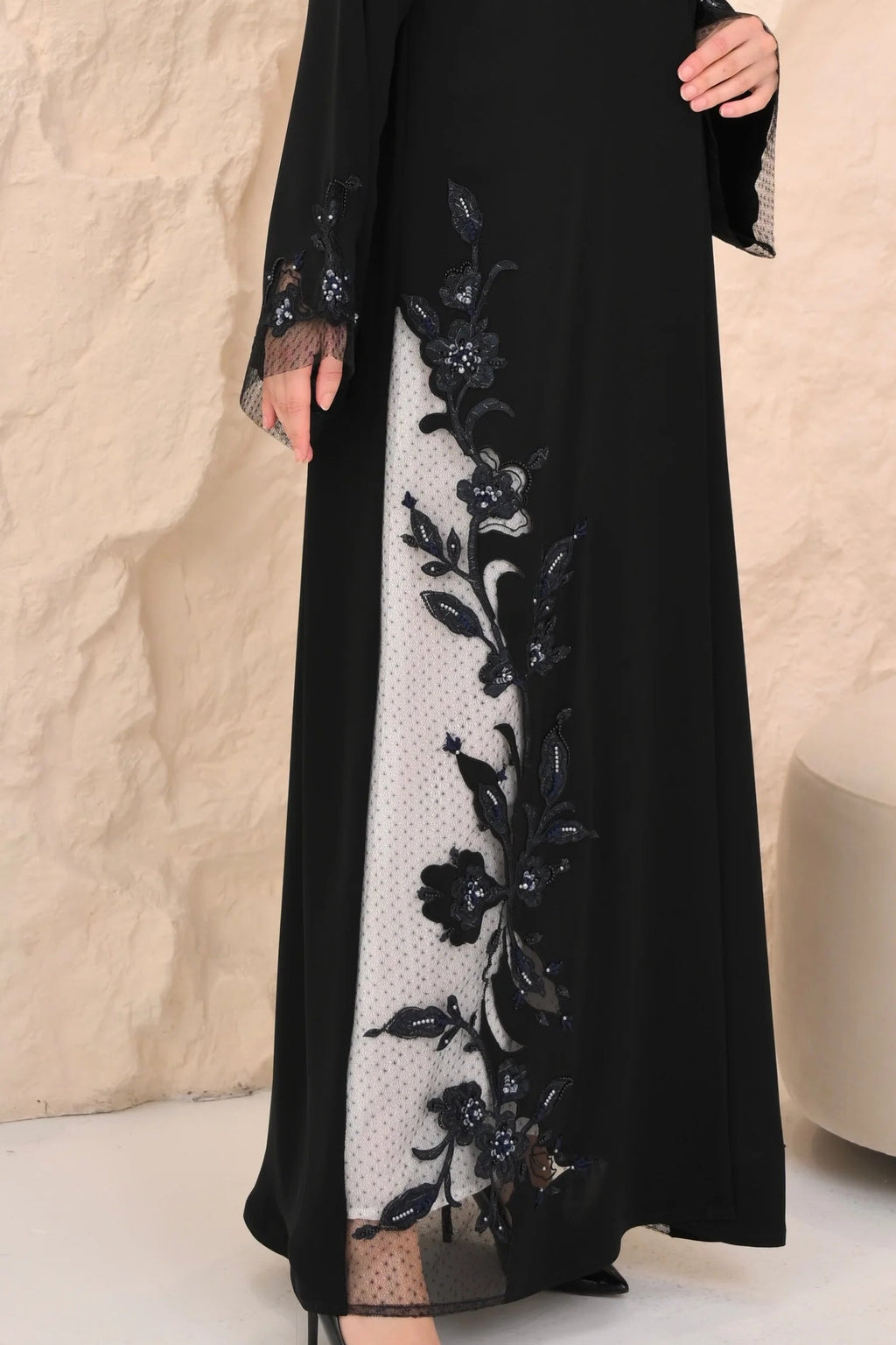 Black abaya side view — sheer floral panels with Dori handwork Al Anood UAE