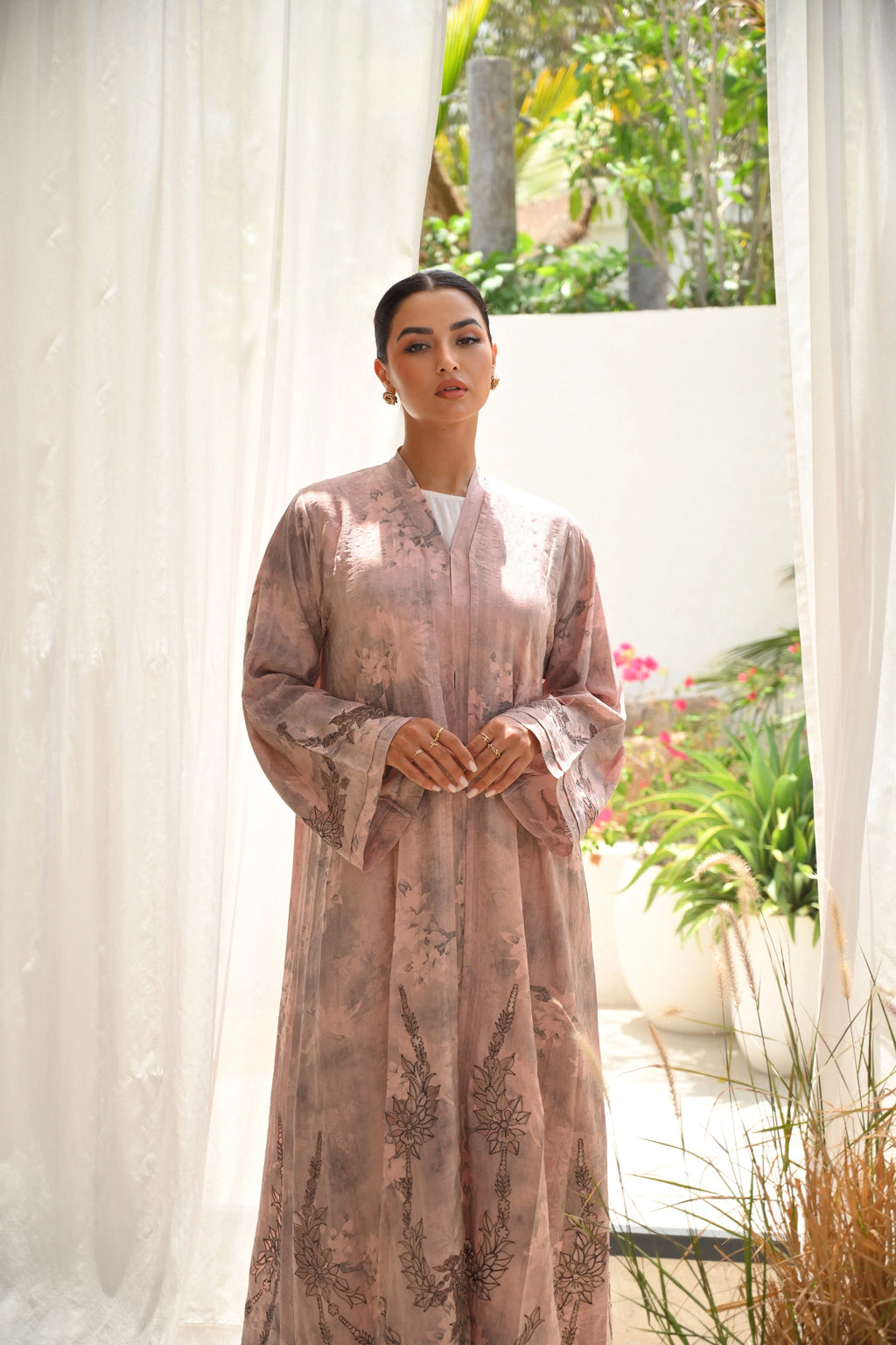 Luxury blush pink tie-dye abaya with laser cut details and Aari embroidery