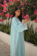 Light blue Emirati abaya with laser cut embroidery on sleeves and side panels