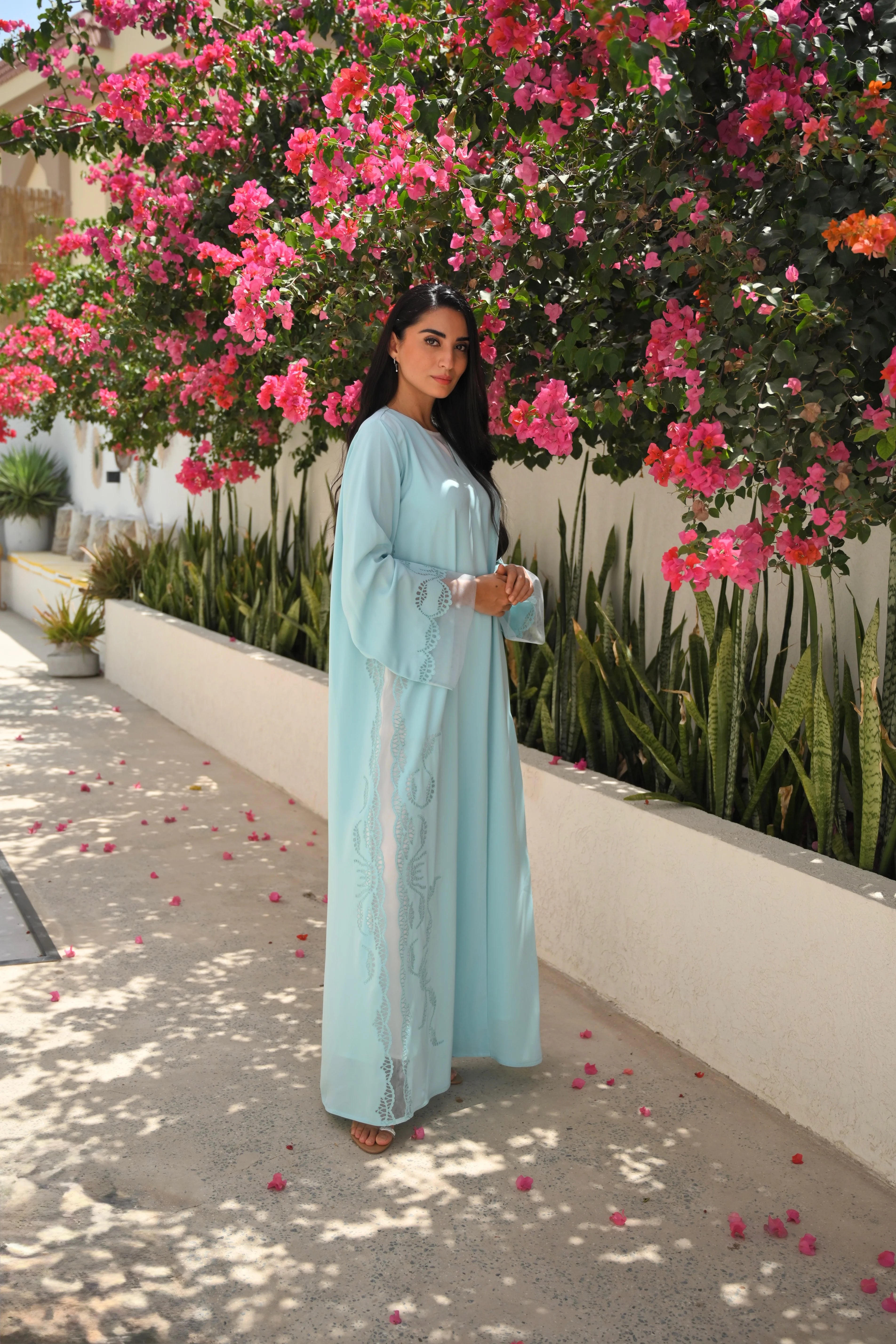 Light blue Emirati abaya with laser cut embroidery on sleeves and side panels