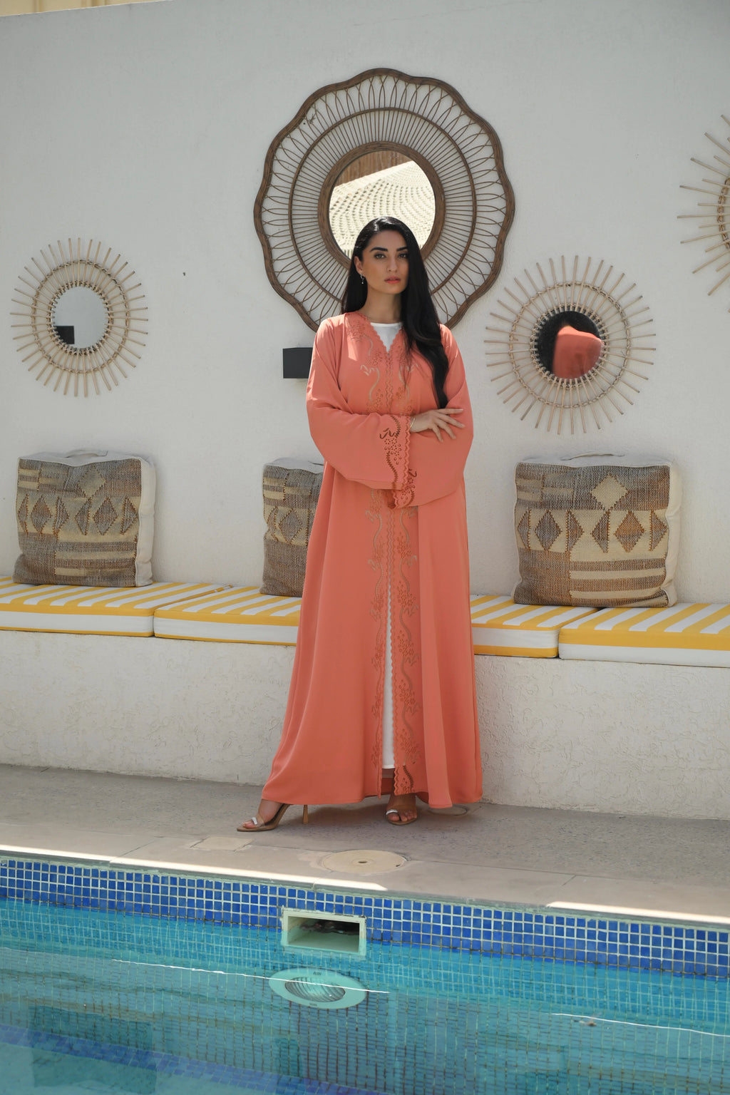 Luxury coral pink Emirati abaya with laser cut details and Aari embroidery