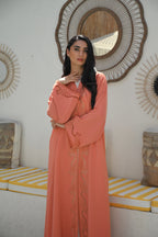 Luxury coral pink Emirati abaya with laser cut details and Aari embroidery