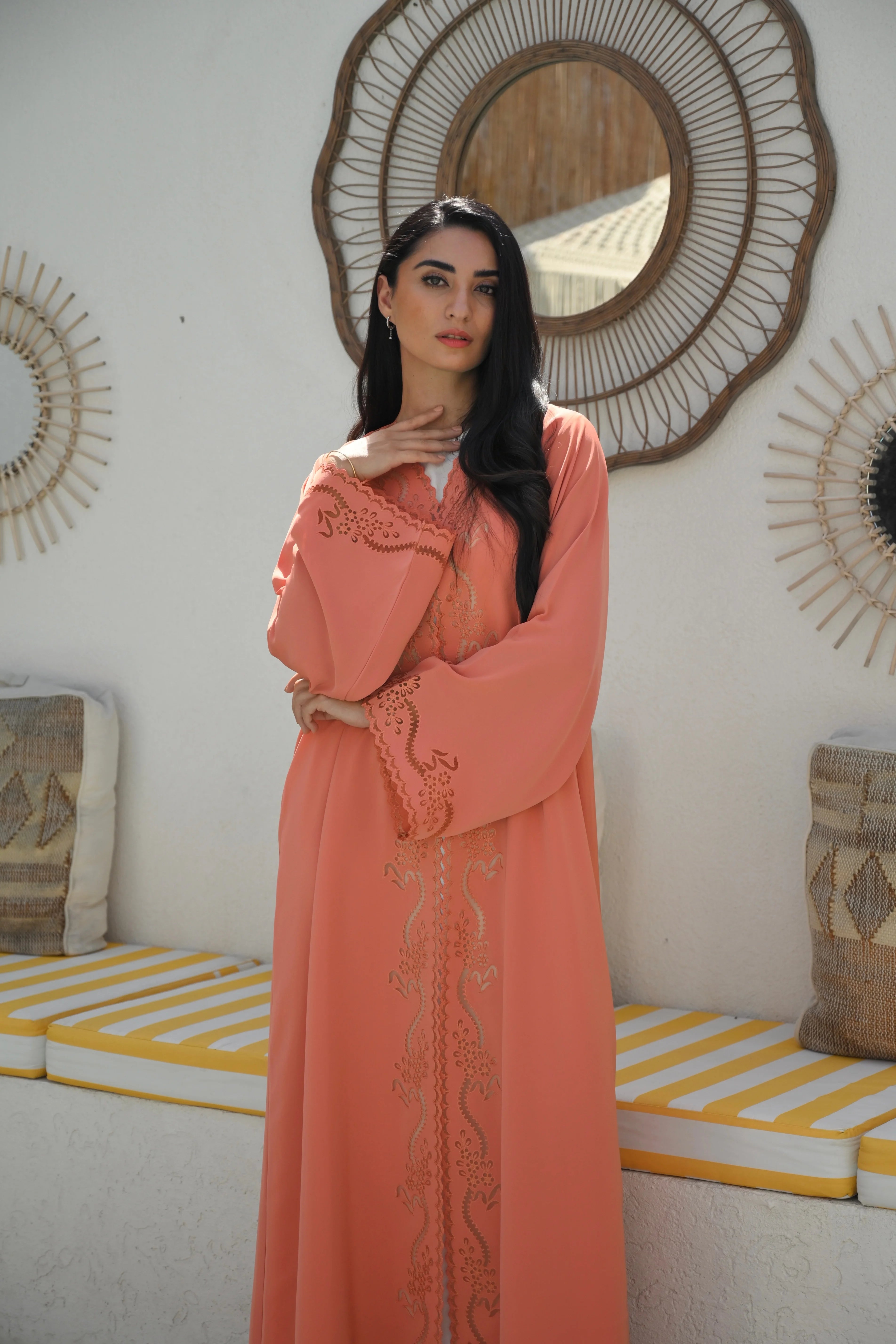 Luxury coral pink Emirati abaya with laser cut details and Aari embroidery