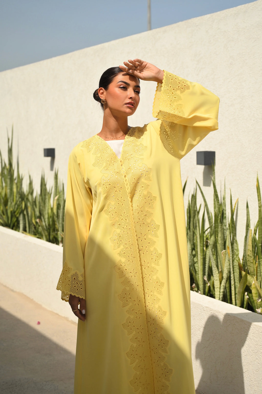 Luxury yellow Emirati abaya with laser cut embroidery on front panel and sleeves