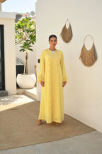 Luxury yellow Emirati abaya with laser cut embroidery on front panel and sleeves
