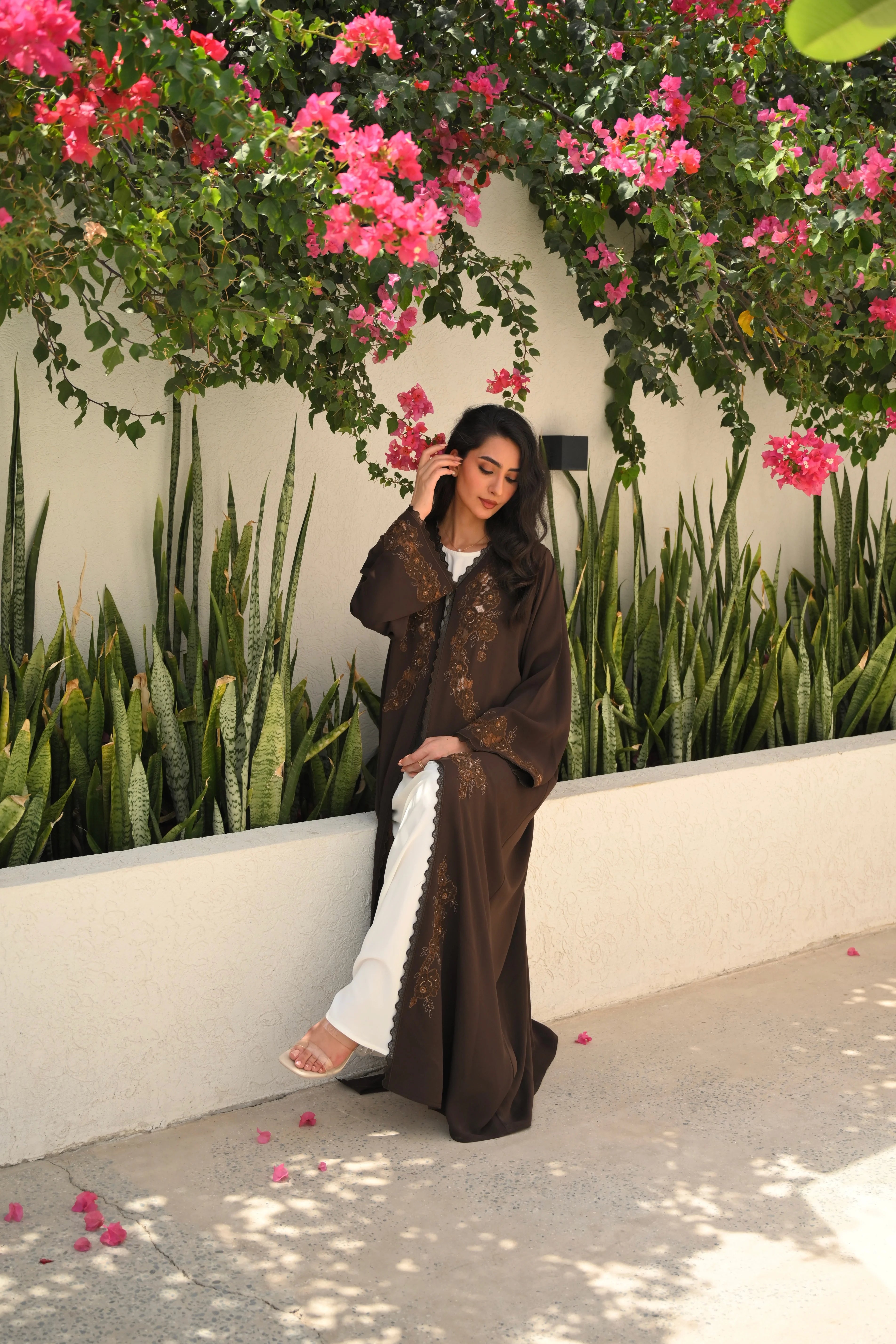 Luxury brown abaya with elegant handwork embroidery details on the front and sleeves