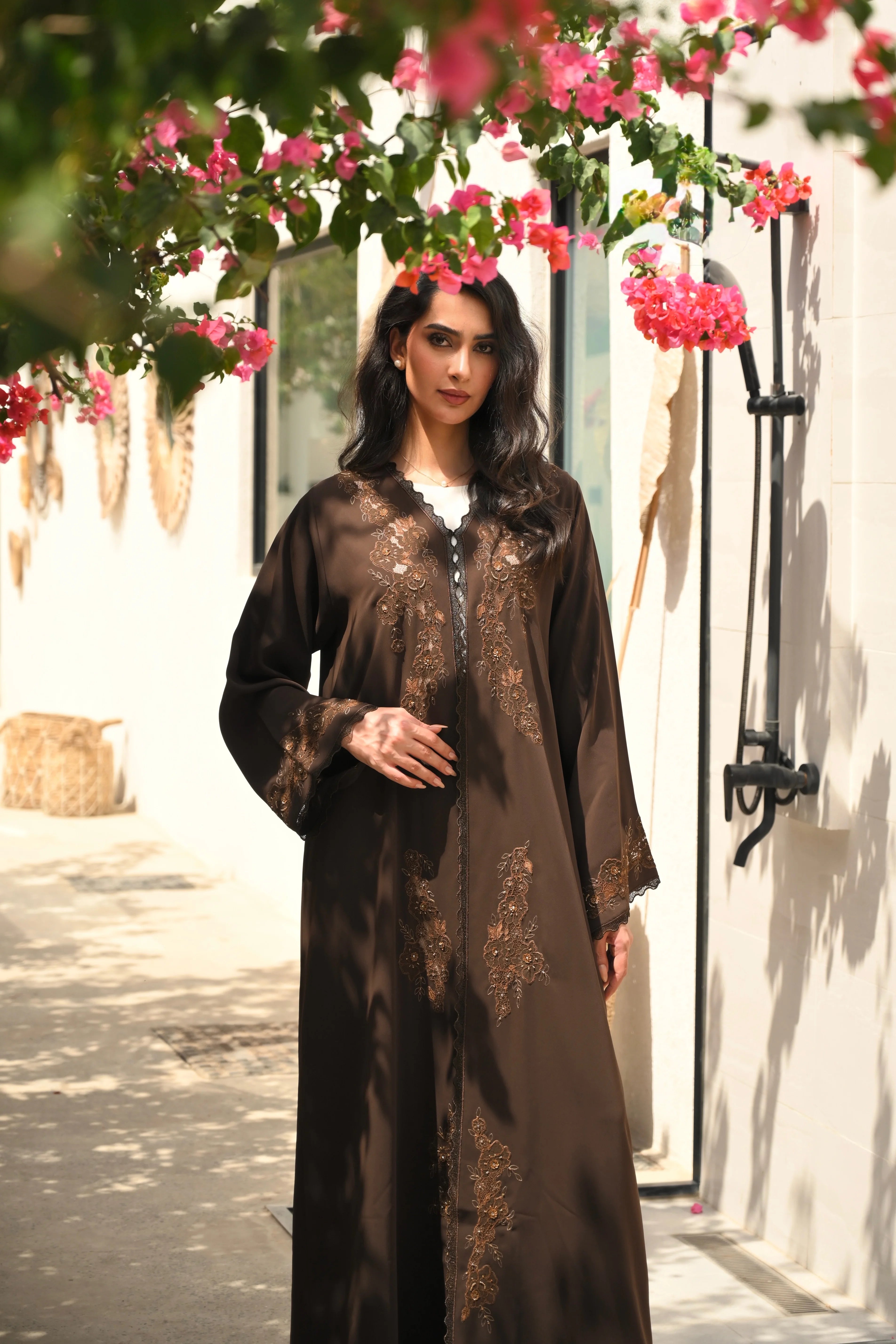 Luxury brown abaya with elegant handwork embroidery details on the front and sleeves