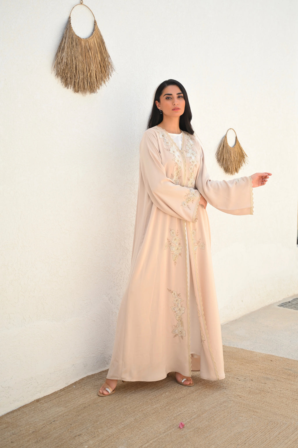 Soft beige Emirati abaya with laser embroidery on the chest and sleeves