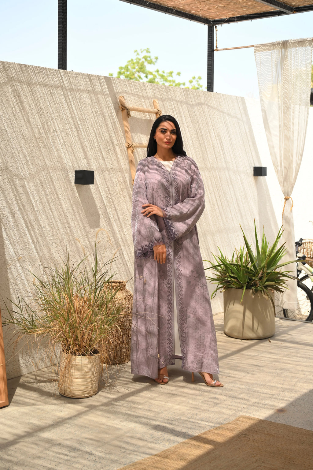 Luxury dusty lavender Emirati abaya with dori detailing and laser cut design on front panel and sleeves