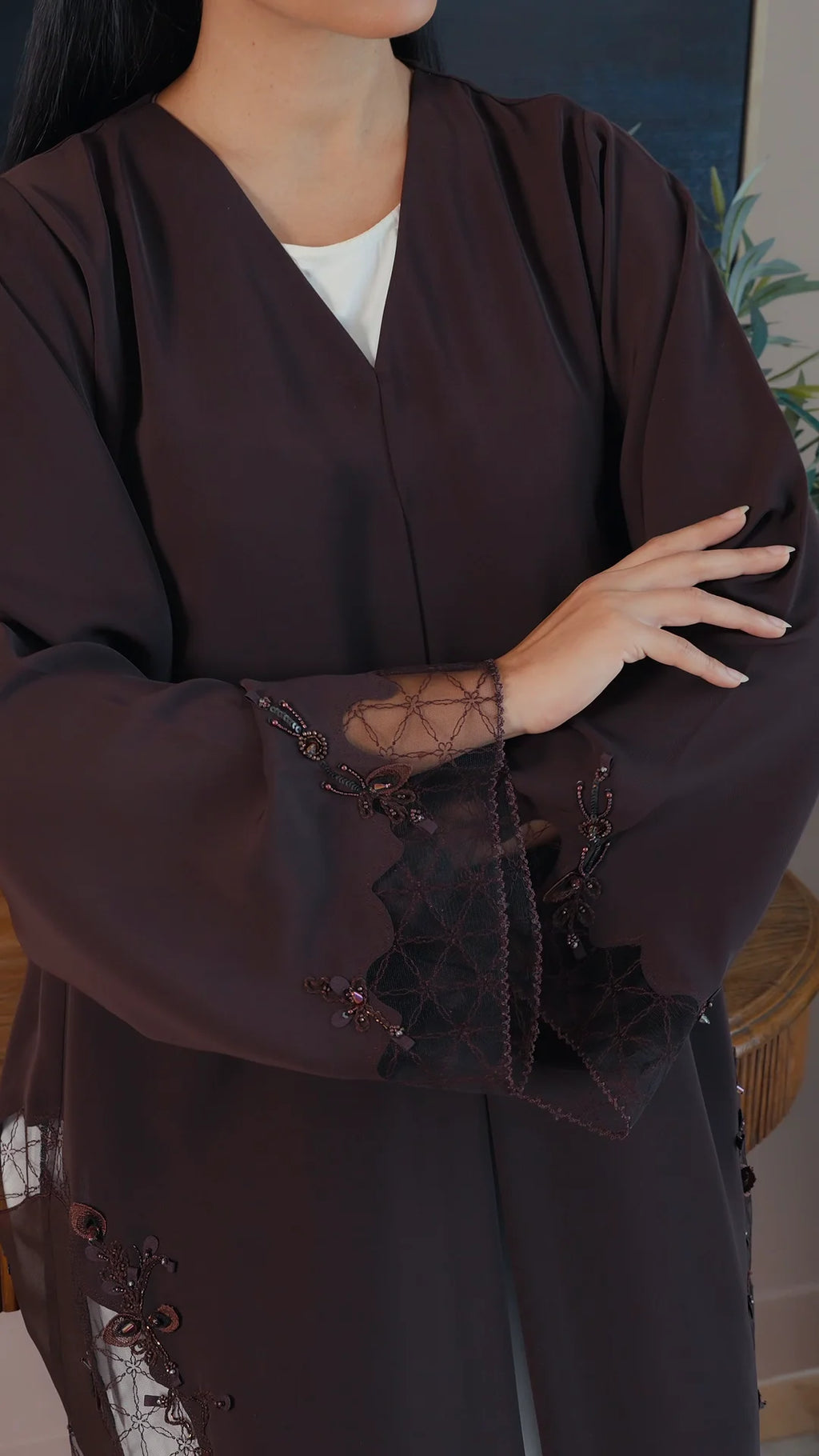 Luxury dark brown Emirati abaya with theatre embroidery and transparent handwork detailing on sleeves and sides