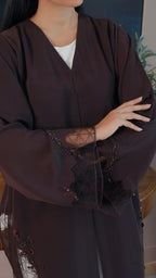 Luxury dark brown Emirati abaya with theatre embroidery and transparent handwork detailing on sleeves and sides