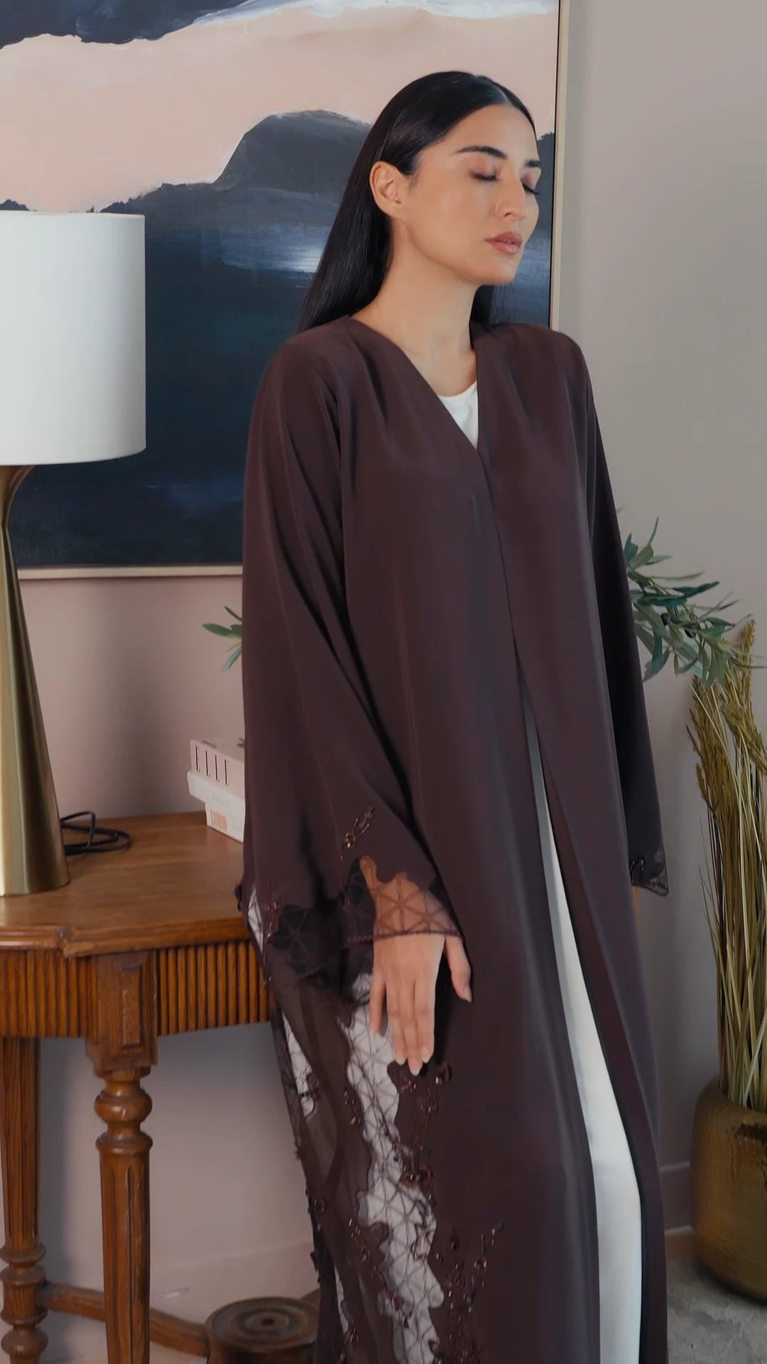 Luxury dark brown Emirati abaya with theatre embroidery and transparent handwork detailing on sleeves and sides