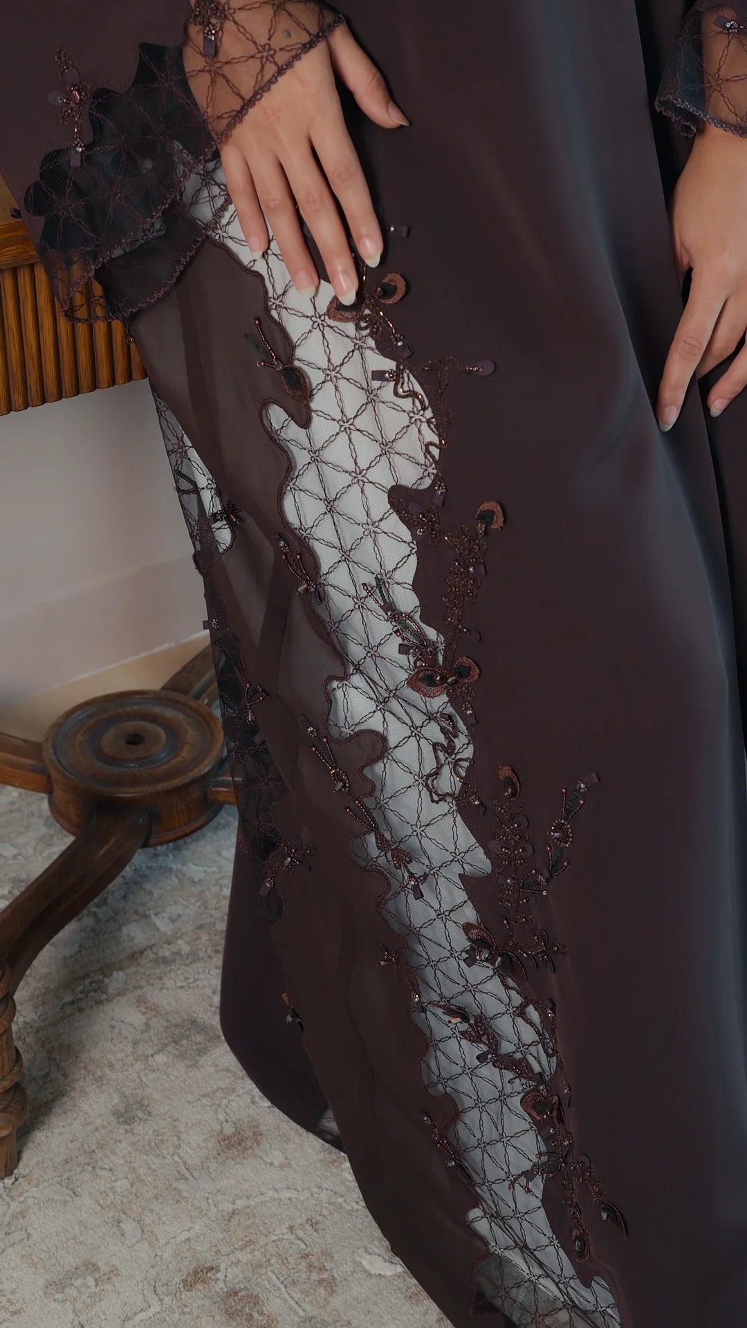 Luxury dark brown Emirati abaya with theatre embroidery and transparent handwork detailing on sleeves and sides