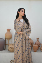 Luxury floral lace abaya with blue flower details and elegant flowing Emirati design