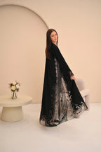 Luxury black abaya side view — Dori handwork on full sheer hem Al Anood UAE