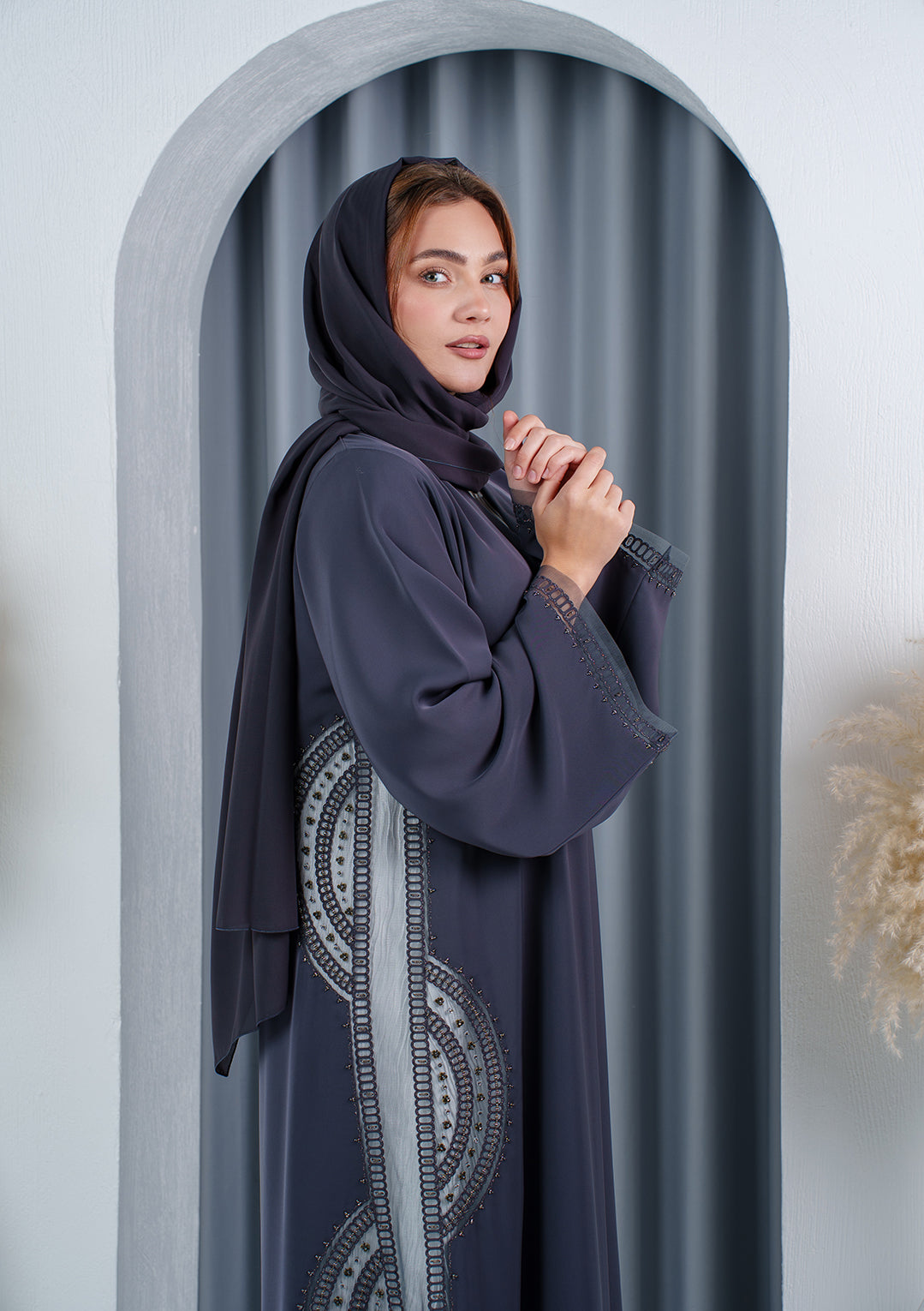 Elegant Emirati abaya with circular embroidery details