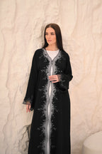 Elegant black abaya front view — floral embroidery detail Al Anood