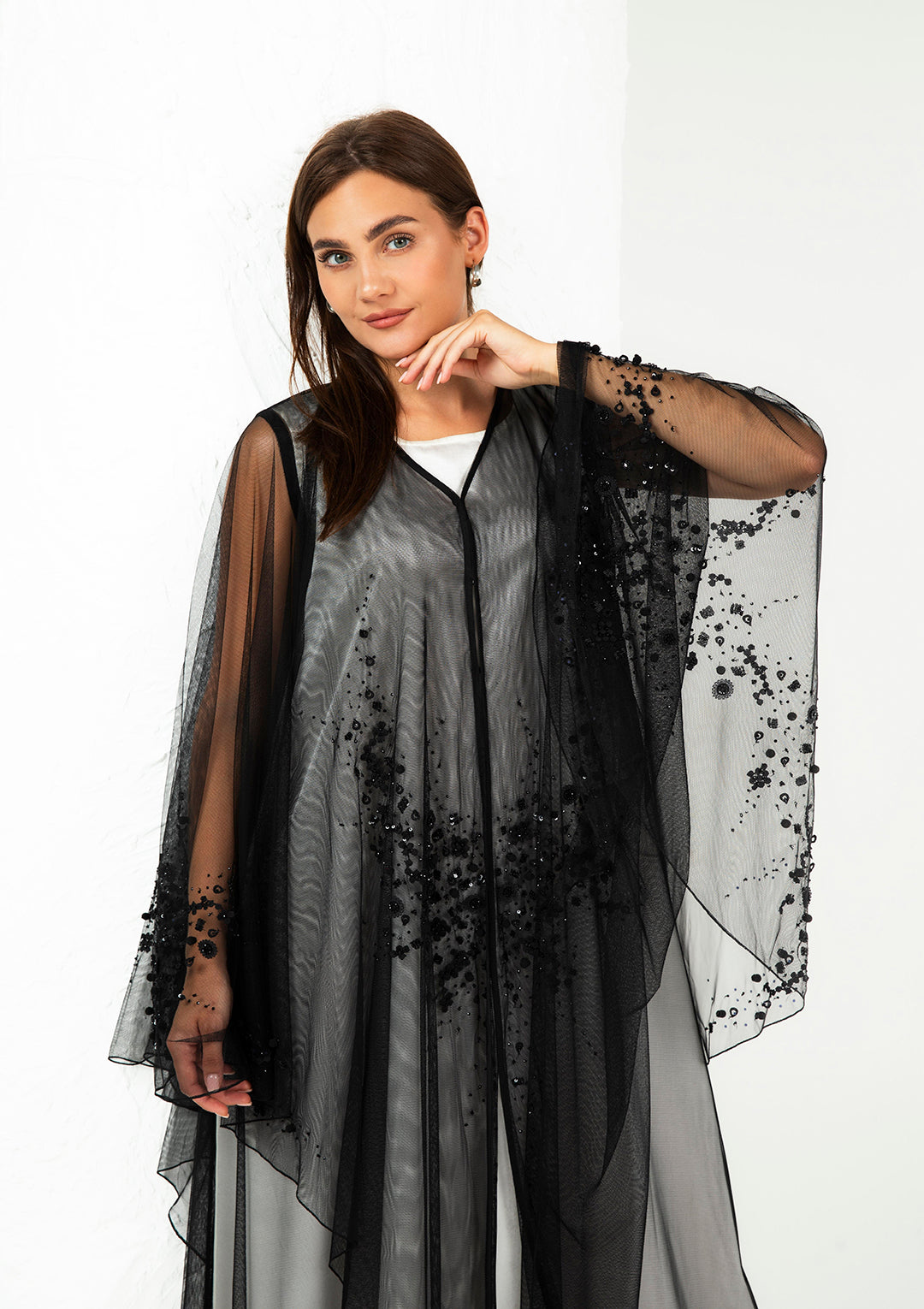 Elegant black sheer abaya front view — hand-placed beading detail Al Anood UAE