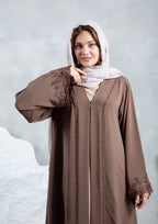 Elegant Emirati abaya with tone on tone embroidery detail