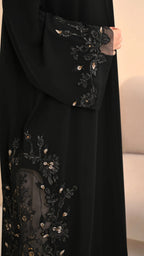 Floral hand embroidery close-up black Nida abaya — Al Anood UAE