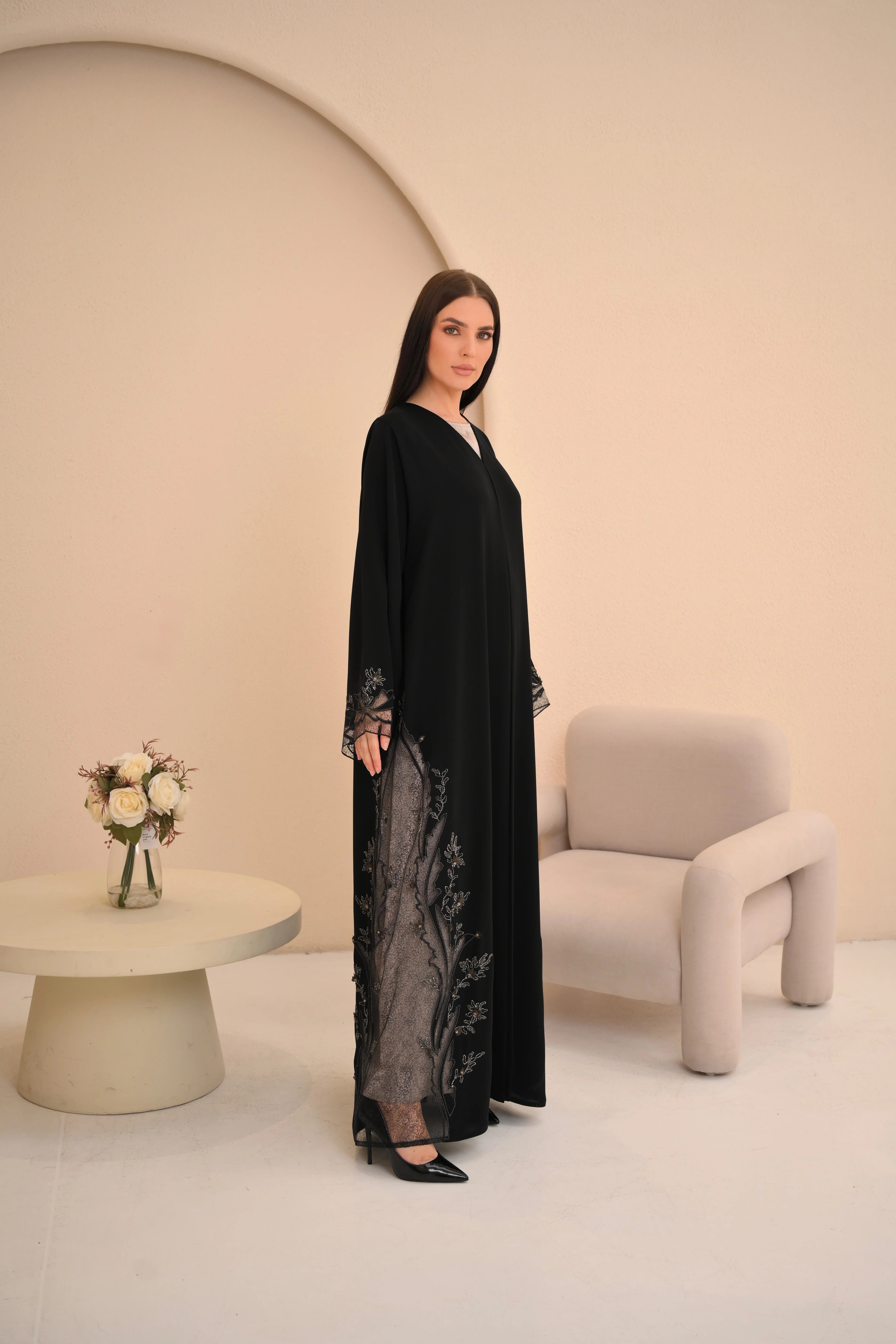 Hand embroidery detail on sheer hem black Nida abaya — Al Anood UAE