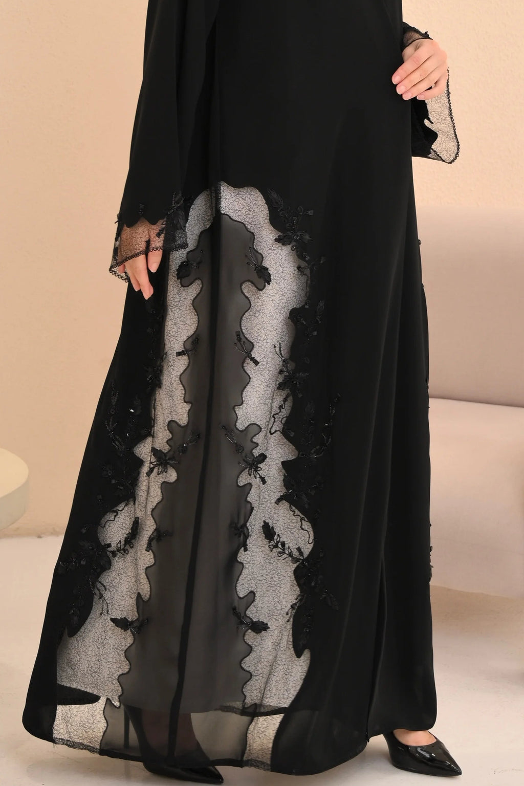 Luxury black abaya side view — sheer panels with organic hand embroidery Al Anood