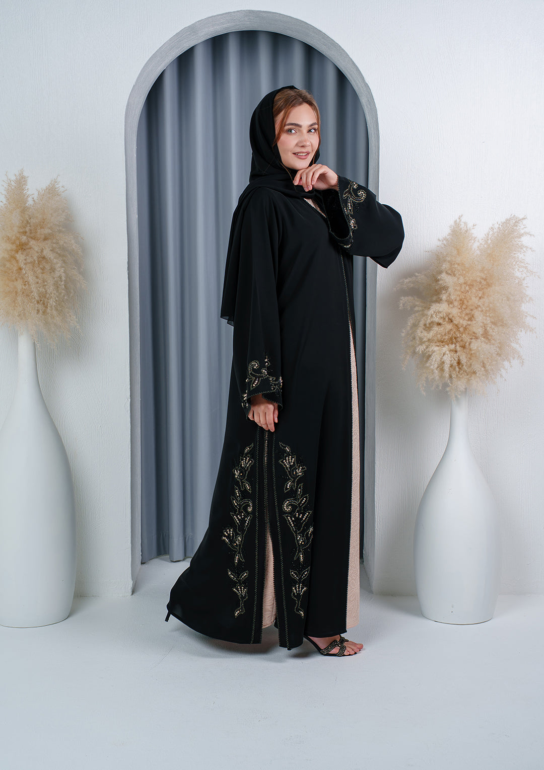 Luxury black embroidered abaya with lace details made from Nida fabric by Al Anood