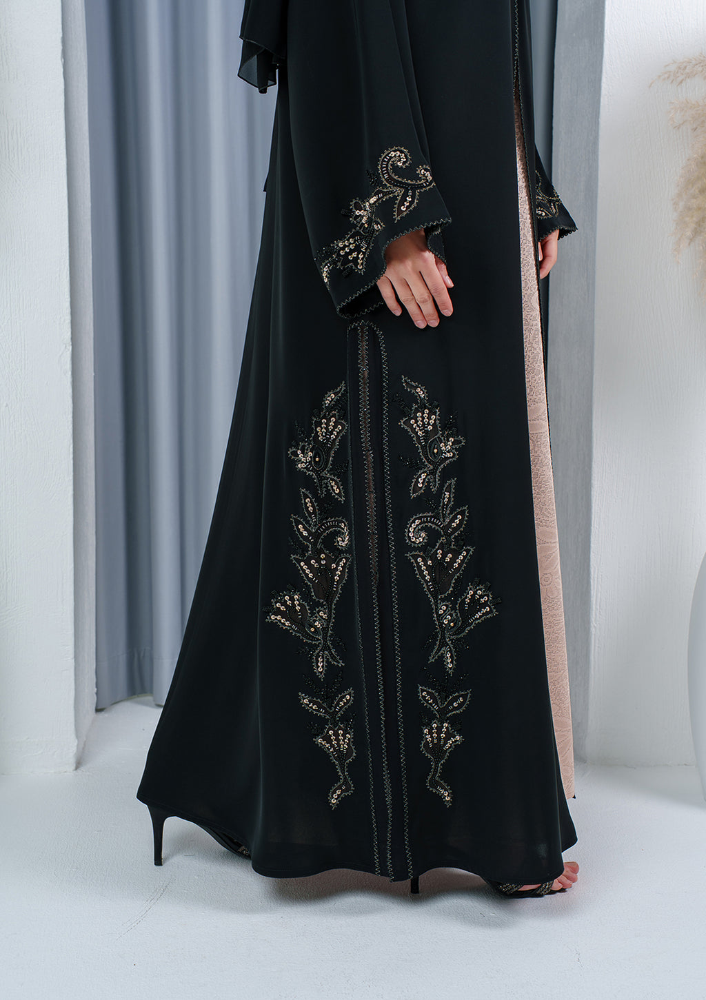 Luxury black embroidered abaya with lace details made from Nida fabric by Al Anood