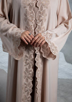 Modern modest abaya fashion in soft nude color