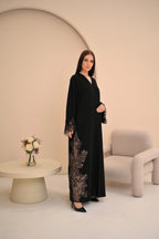 Elegant black Nida abaya with embroidered sheer panels and crystal — Al Anood UAE