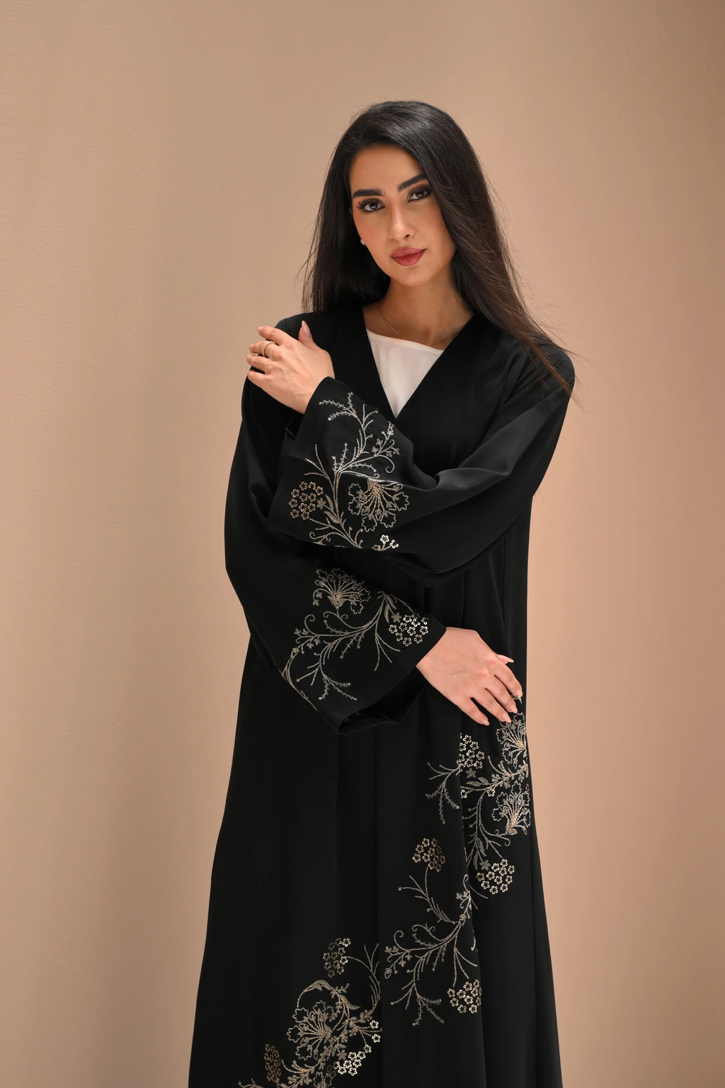 Black Nida abaya with elegant floral computer embroidery on sleeves and side panel