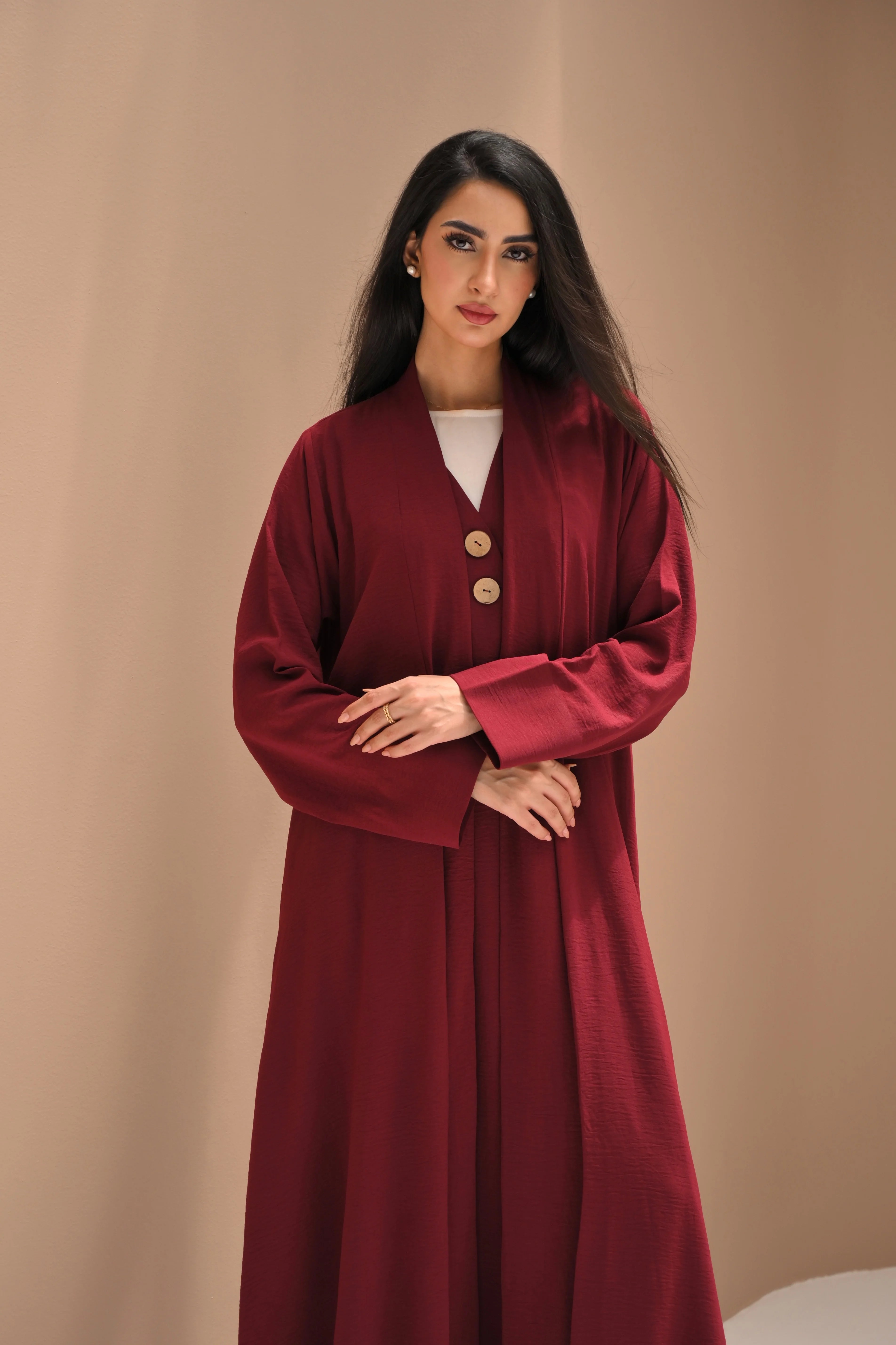 Royal burgundy nida fabric abaya for women with elegant ready-to-wear Emirati design