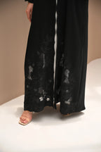 Black Nida abaya with hand embroidery and crystal detailing on sleeves and lower panels