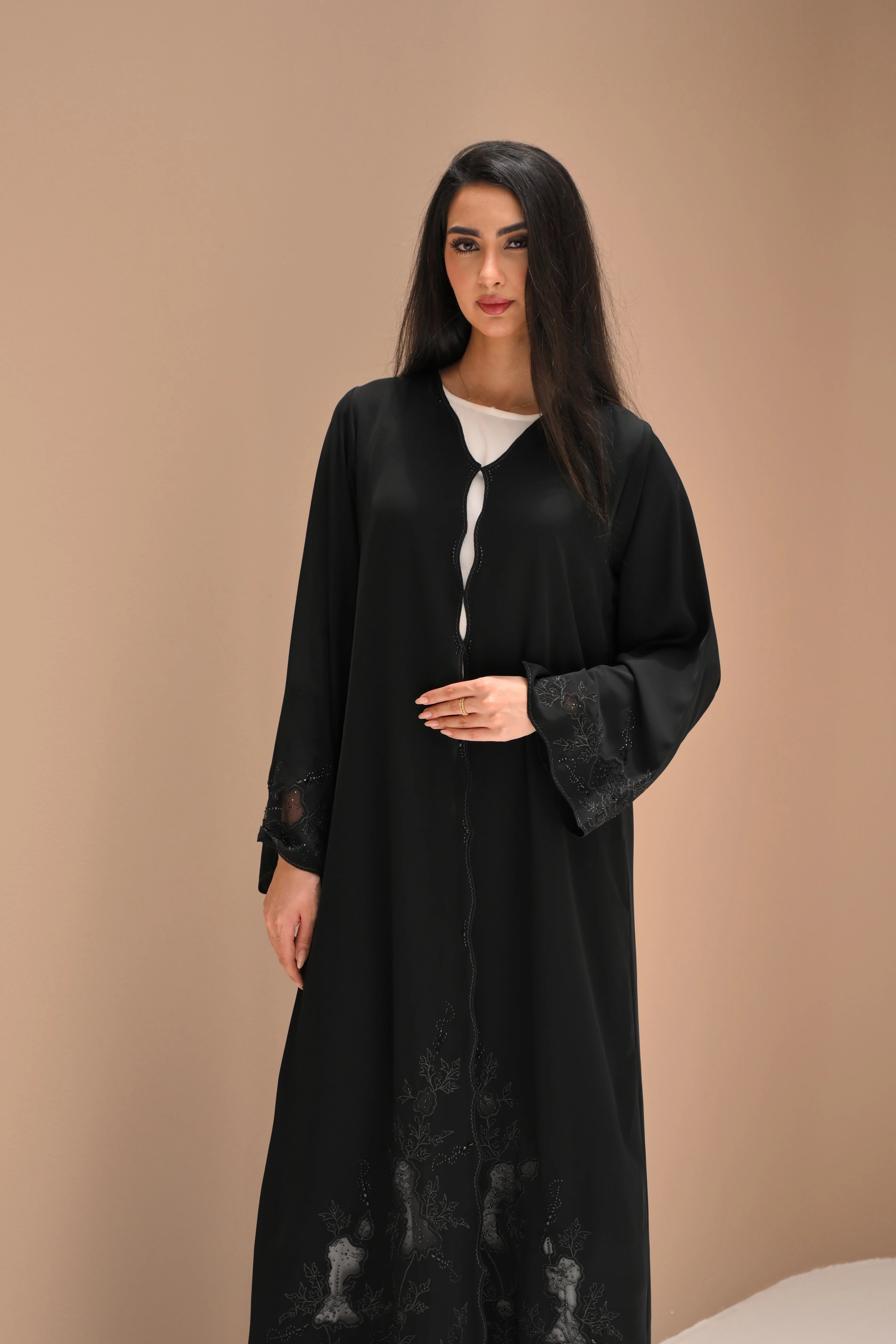 Black Nida abaya with hand embroidery and crystal detailing on sleeves and lower panels