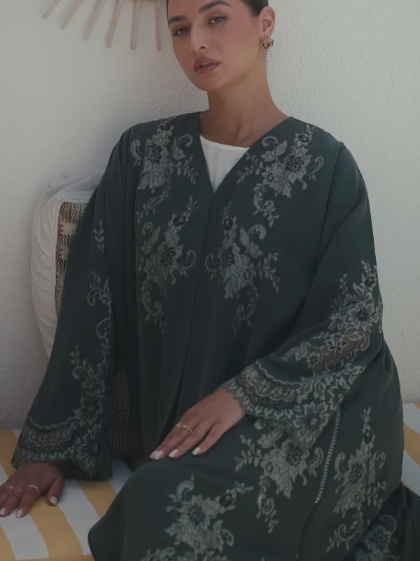 Luxury olive green Nida abaya with embroidery and lace detailing on chest, sleeves and sides