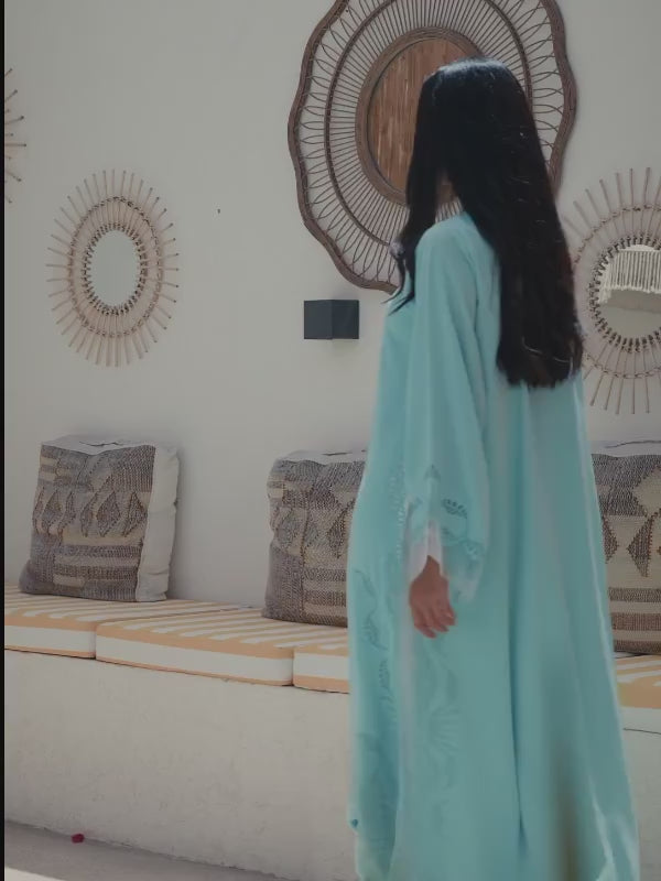 Light blue Emirati abaya with laser cut embroidery on sleeves and side panels