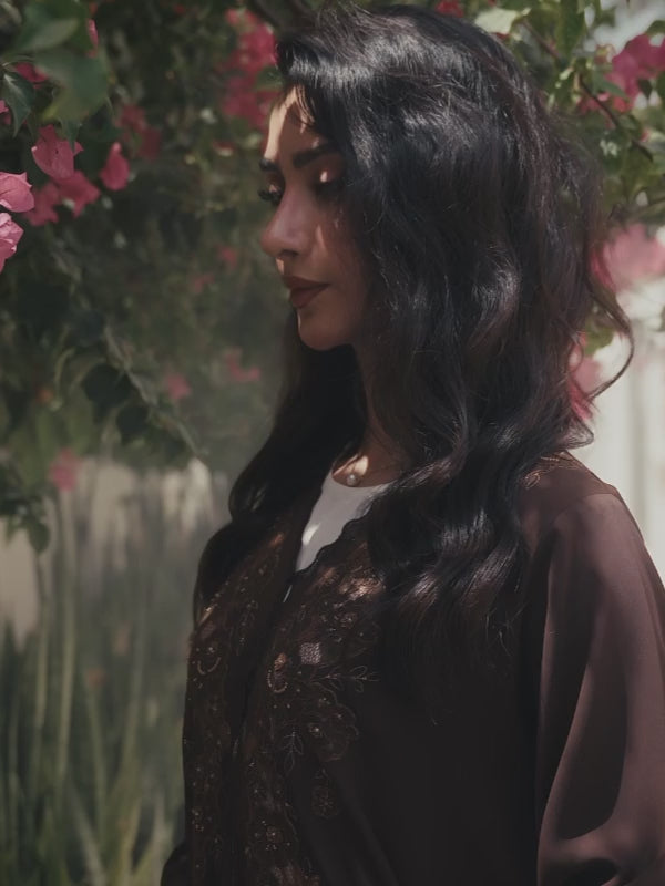 Luxury brown abaya with elegant handwork embroidery details on the front and sleeves