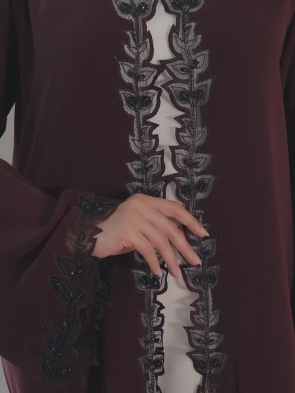 Burgundy luxury Emirati abaya with Aari embroidery and elegant handwork on sleeves and front