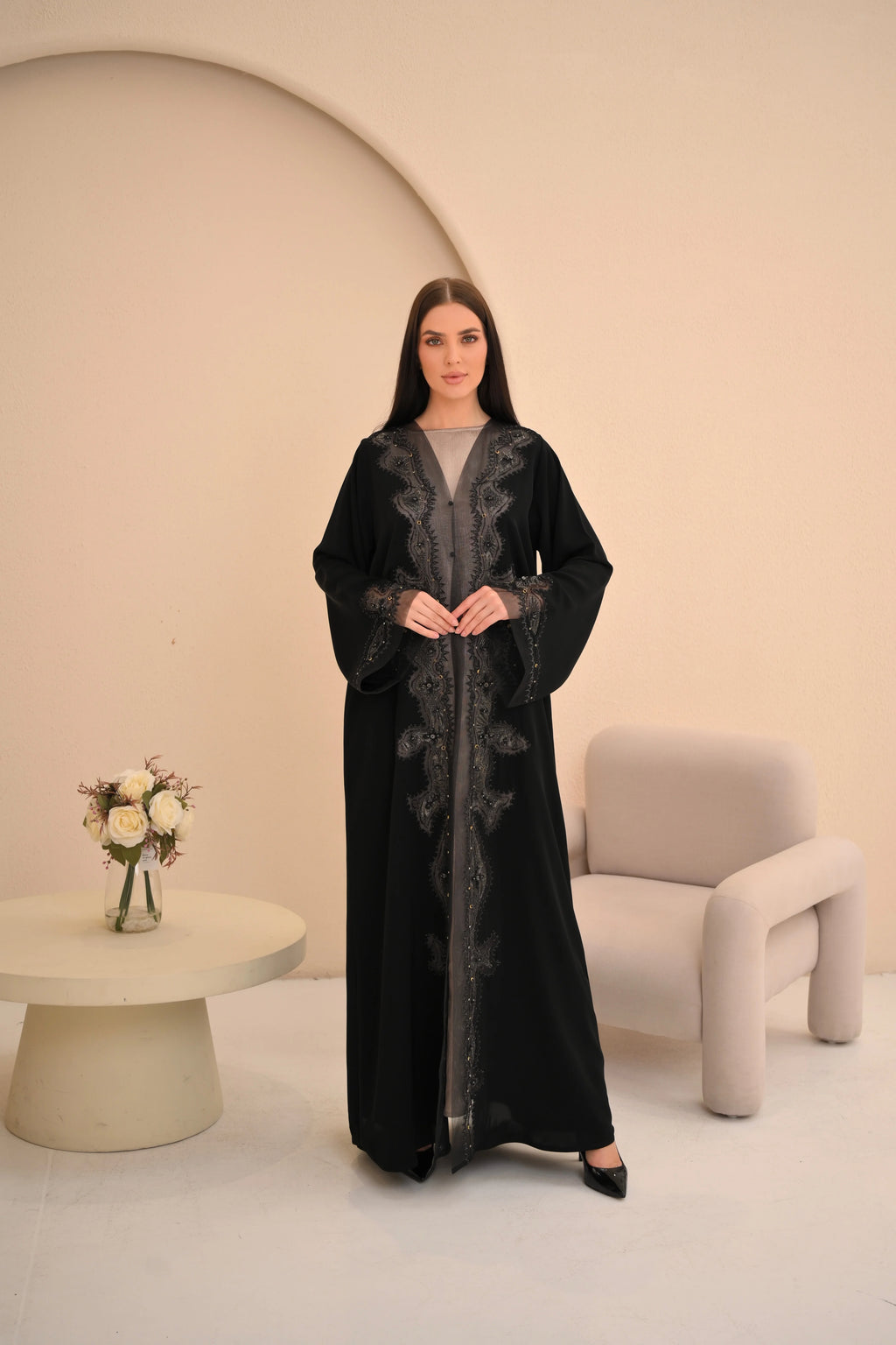 Luxury black abaya front view — wave hand embroidery from neckline to hem Al Anood
