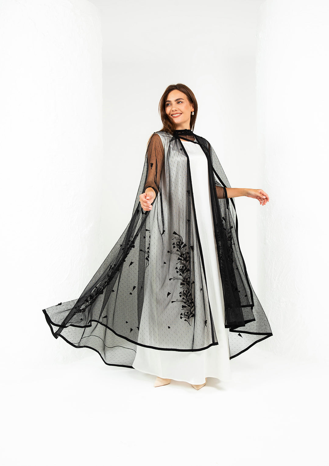 Black sheer tulle wedding abaya with 3D laser-cut floral motifs — Al Anood UAE